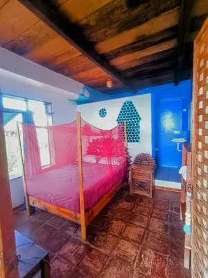 Cama o camas de una habitación en Balamjuyuc Cabañas y Ecohostel