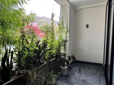 Jardín al aire libre en Biulu Apartment at Tangolunda Bay