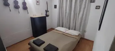 Cama o camas de una habitación en Apartamento cerca del Aeropuerto