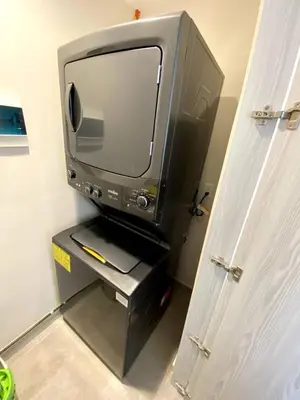 Una televisión o centro de entretenimiento en Sonata en Alpha Residences Lomas de Angelop