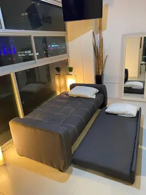 Cama o camas de una habitación en Penthouse in front of Estrella de Puebla 16 guest