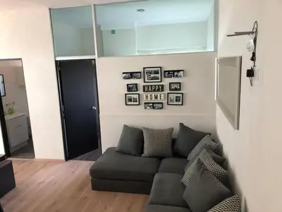 Zona de estar de Penthouse by Estrella de Puebla in Angelopolis
