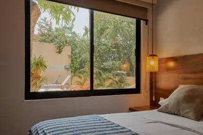 Cama o camas de una habitación en Casa Mosaicos - Adults only