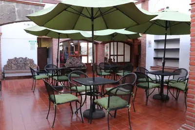 Un restaurante o sitio para comer en Hotel Cuamanco