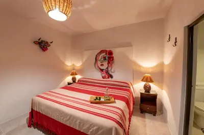 Cama o camas de una habitación en La Casa Carlota