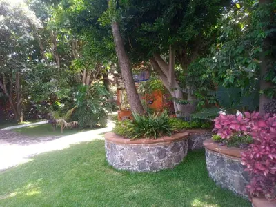 Jardín al aire libre en Casa Calnacazco