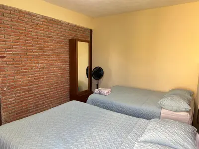 Cama o camas de una habitación en Ideal apartment to rest near the Airport