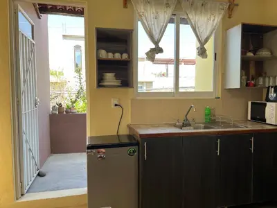 Una cocina o zona de cocina en Ideal apartment to rest near the Airport