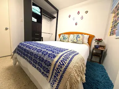 Cama o camas de una habitación en Mexicaníssima 4BR, 4 to 11 guests in Coyoacán