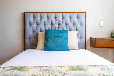 Cama o camas de una habitación en New Acapulco Retreat Garden Pool & Gym