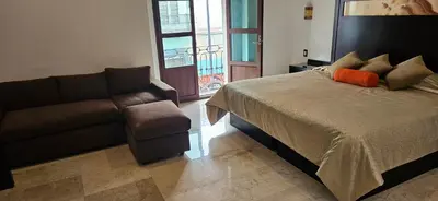 Cama o camas de una habitación en Nonó Hotel