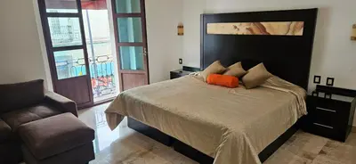 Cama o camas de una habitación en Nonó Hotel