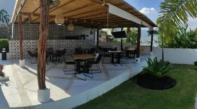 Un restaurante o sitio para comer en Hermoso Depto en Condominio Astoria