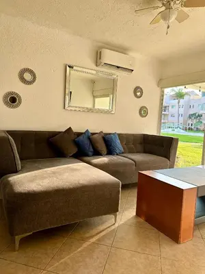 Zona de estar de Departamento en Pb frente a la alberca