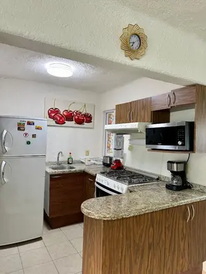 Una cocina o zona de cocina en Departamento en Pb frente a la alberca