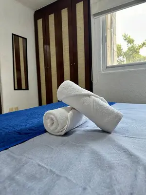 Cama o camas de una habitación en Departamento en Pb frente a la alberca