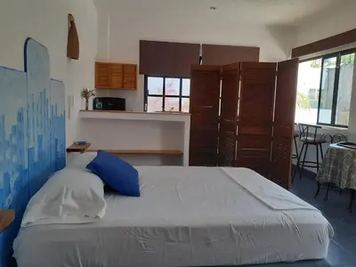 Cama o camas de una habitación en Villa Ébano