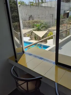Piscina en o cerca de Villa Ébano