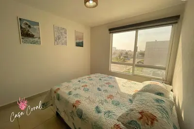 Cama o camas de una habitación en Depa Coral con Club de Playa Exclusivo Playa Bonfil Diamante