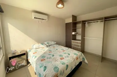 Cama o camas de una habitación en Depa Coral con Club de Playa Exclusivo Playa Bonfil Diamante