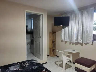 Una televisión o centro de entretenimiento en Hotel Mextlitlán Tierra de Lunas