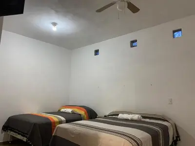 Cama o camas de una habitación en Casa Ba-Al, Bonito departamento a 5 minutos del centro de Oaxaca