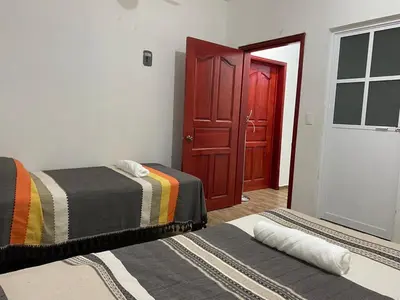 Cama o camas de una habitación en Casa Ba-Al, Bonito departamento a 5 minutos del centro de Oaxaca