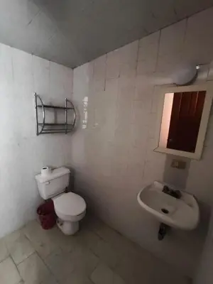 Un baño de Departamentos del Jardín de Toribio