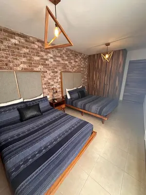 Cama o camas de una habitación en Hermosa Villa Acapulco Zona Diamante