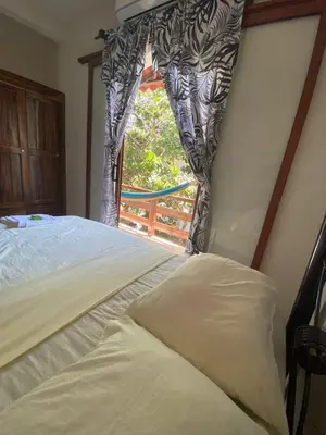 Cama o camas de una habitación en ESPERANZA Casa de Huéspedes