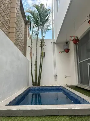 Plano de Comfy House with Heated Pool