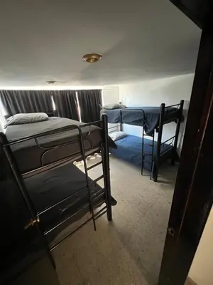 Cama o camas de una habitación en BORAR PRUEBa