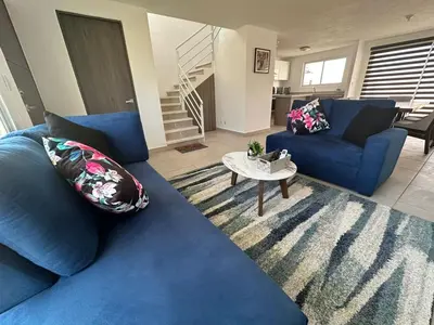 Zona de estar de Casas MAJUM Corvus