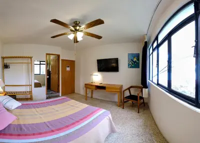 Cama o camas de una habitación en Luz Casa de Huespedes