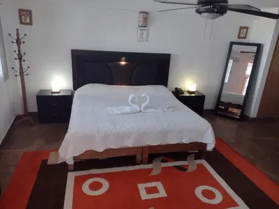 Cama o camas de una habitación en Hotel Leyenda del Tepozteco