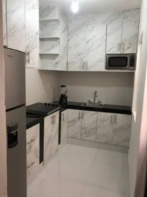 Una cocina o zona de cocina en casa jireh