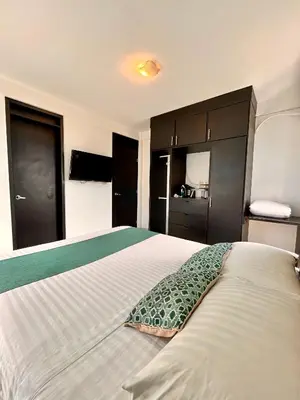 Cama o camas de una habitación en Charming and Family With a pool and ocean view, 3 blocks from the beach, with 2 TVs and Netflix & HBO