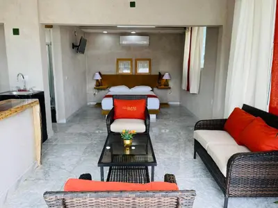Zona de estar de Villa Coco Mare Suite 1