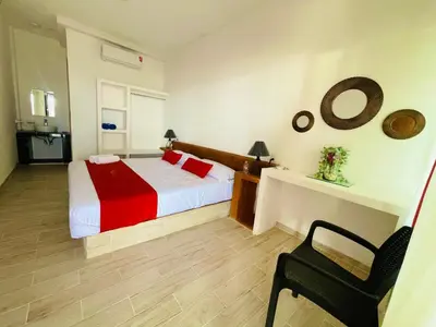 Cama o camas de una habitación en Villas Coco Mare Habitacion 4