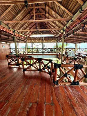Un restaurante o sitio para comer en Villas Coco Mare Habitacion 5