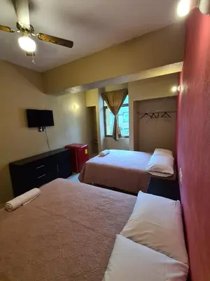 Cama o camas de una habitación en Hotel Arcadia Cuernavaca