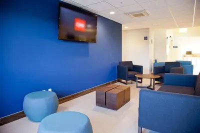 Una televisión o centro de entretenimiento en City Express by Marriott Apizaco