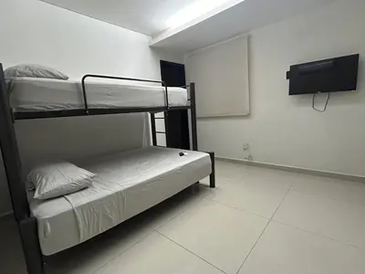 Cama o camas de una habitación en Vista a Playa con Alberca en Blvd principal frente al Mar 3hab