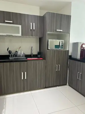 Una cocina o zona de cocina en Vista a Playa con Alberca en Blvd principal frente al Mar 3hab