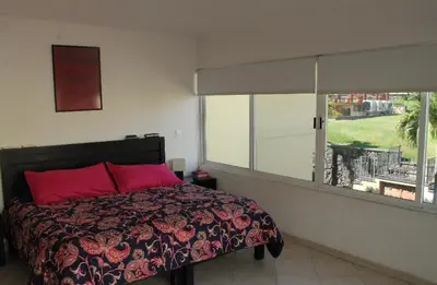 Cama o camas de una habitación en Hermosa Casa de descanso familiar Cuernavaca