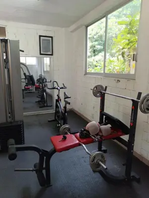 Gimnasio o instalaciones de fitness de Hotel Narváez Dorado Centro de Convenciones