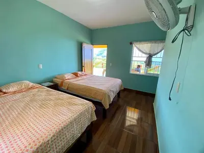 Cama o camas de una habitación en Cascada el tucan