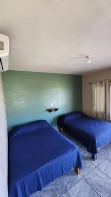 Cama o camas de una habitación en Cascada el tucan
