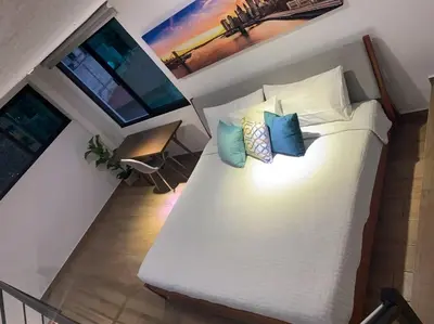 Cama o camas de una habitación en Casa Carolina Loft Aryaz