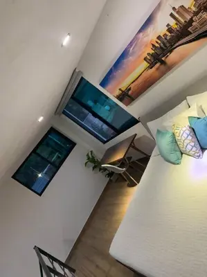 Una televisión o centro de entretenimiento en Casa Carolina Loft Aryaz